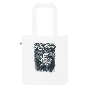 Rhythmo Tote BagStylishly go green with the Rhythmo Tote Bag. A spacious, organic cotton gem that adds a chic eco-tint to your look. • Light and thin material • 100% organic cotton • Monochromatic look • Open main compartment with wide bottom • Fabric wei